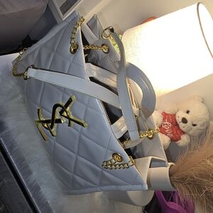 Elegant White Quilted Shoulder Bag with Gold Accents